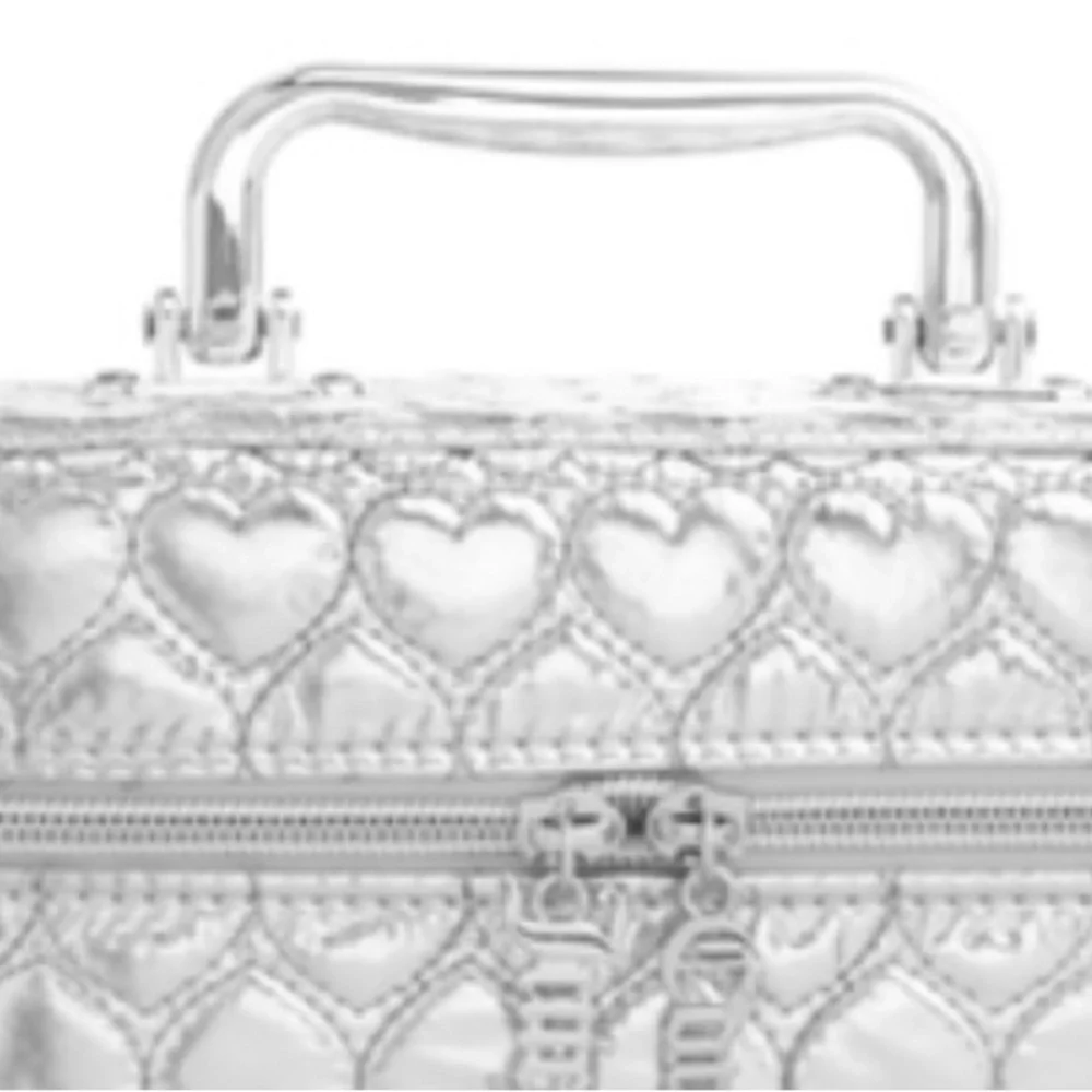 JUICY COUTURE SILVER METALLIC PUFFER MAKEUP TRAIN CASE